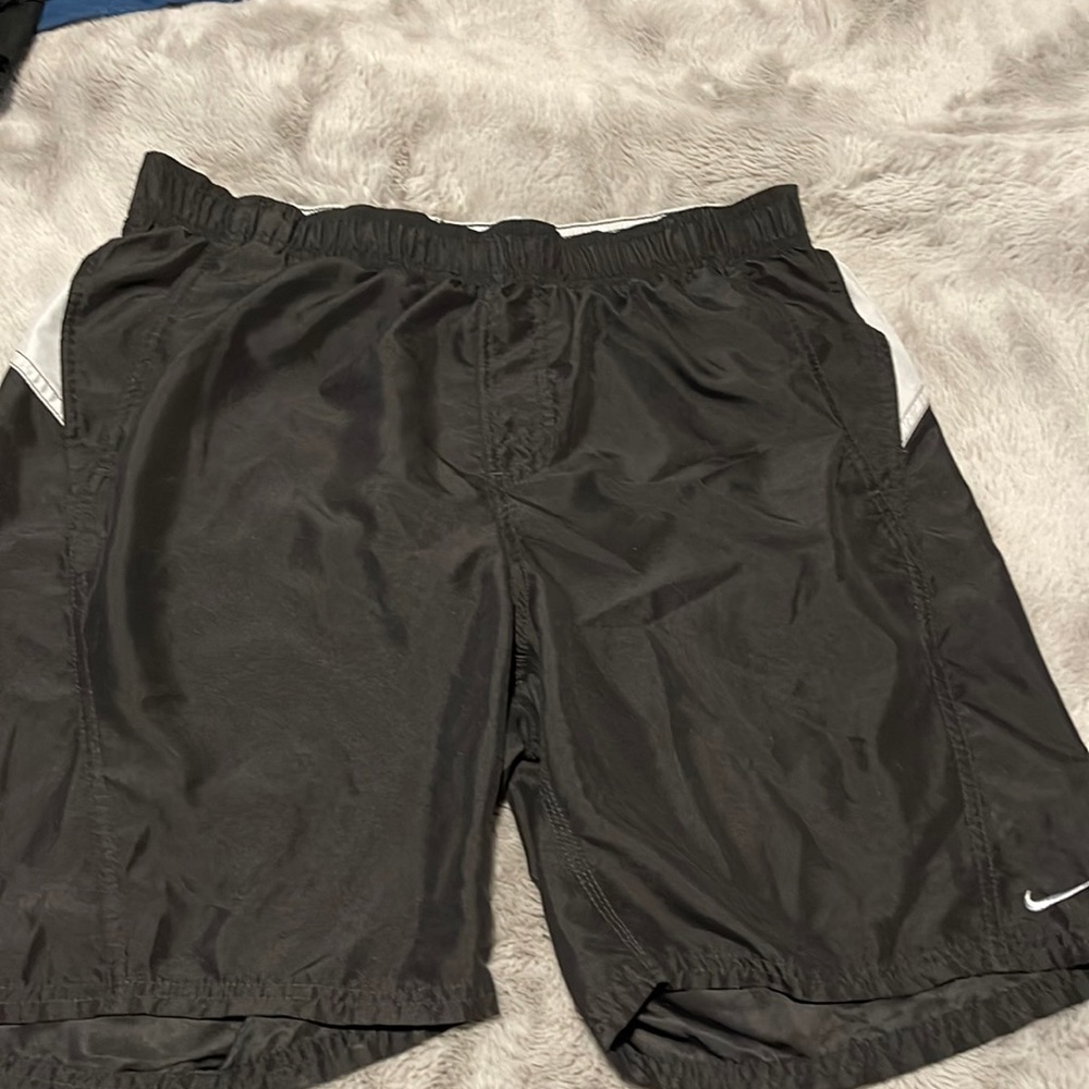 Used Nike Retro swim shorts size (M).